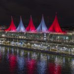 Canada place sails of light coloured red and white